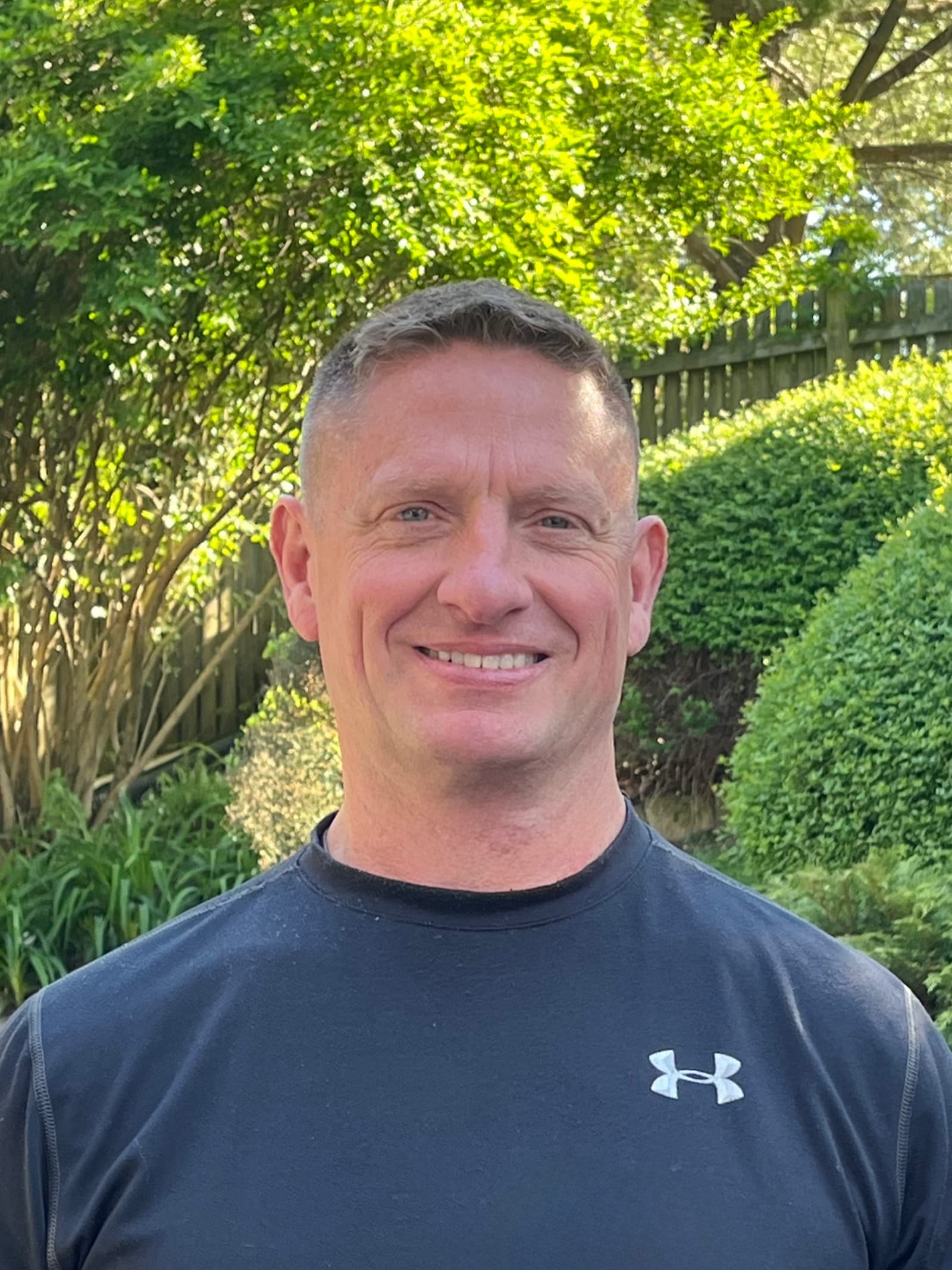 Adam Long, founder and private firearms instructor at LongArm Defense, photographed outdoors in Carroll County, Maryland
